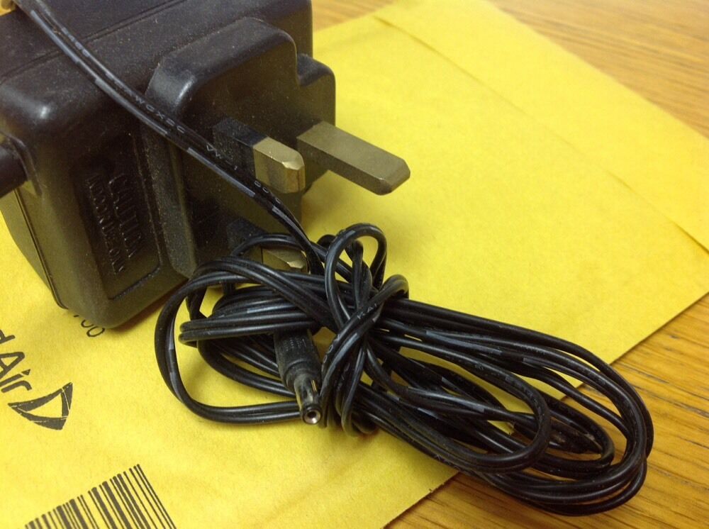 Genuine Ac Adaptor model TD41-050600B 5vdc 600ma